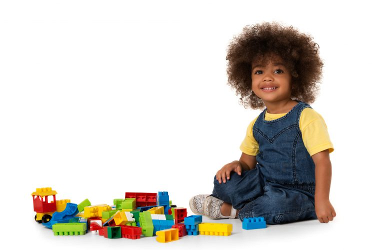 child-with-toys-e1574349524949